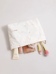 Pink heart embroidered striped makeup bag with gold zipper for cosmetics and skincare