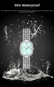 Macro view of mint green dial watch with 30m water resistance splashing in water