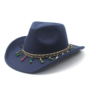Detail of navy wool felt cowboy hat with ethnic embroidered band and colorful wooden beads