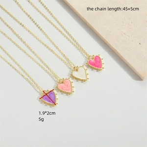 Golden heart pendant necklace set in purple pink white and magenta enamel finish