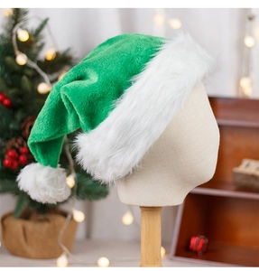 Close-up of green plush Christmas hat with white faux fur trim on mannequin head