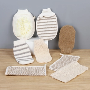 Exfoliating bath set with scrubbing gloves, sponge, and long back strap in beige linen
