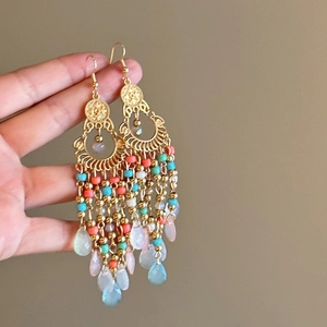 Ethnic bohemian phoenix moon earrings with colorful beads and long gold metal tassels