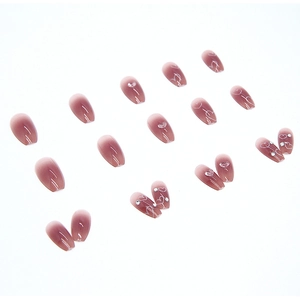 Gradient dusty purple almond press-on nails with heart patterns and small rhinestones