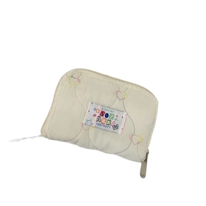 Cream quilted heart zipper coin purse with colorful logo label and nylon texture