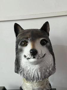 Detailed realistic wolf or husky mask with grey fur texture and lifelike glass eyes