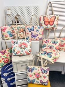 Ethnic print canvas tote bags with various colorful butterfly and floral patterns