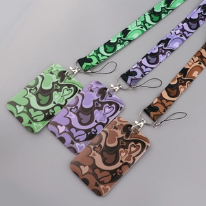 Three polyester lanyards and card holders with swirl heart patterns in green purple and brown