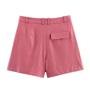 Back view detail of rose pink linen blend shorts featuring belt loops and a flap back pocket