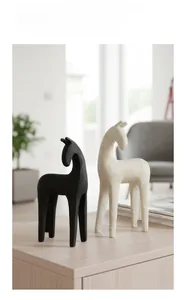Modern minimalist horse sculptures in black and speckled beige for home decor