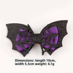 Detail of bat bow hair clip with purple ribbon and glitter mesh showing size dimensions