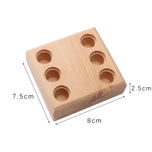 Solid wood tool rack with six holes for pliers storage shown with dimensions 8x7.5cm