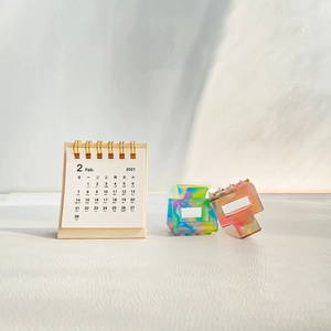 Acetate square cutout claw clips in gradient mosaic colors for high ponytail hairstyles