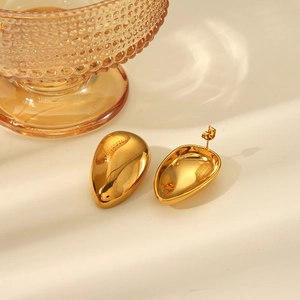 Polished 18k gold plated stainless steel teardrop earrings shown from multiple angles