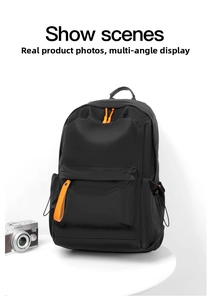 Waterproof Oxford backpack detail with orange zippers and vintage camera on white background