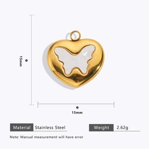 Detail of 15mm 18k gold plated heart pendant with butterfly design and measurements