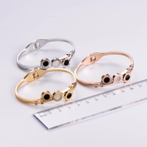Detailed size measurement of roman numeral bangle with black and white shell inlays