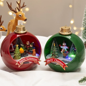 Luminous Christmas globe music box ornament with Santa scene and festive LED lighting