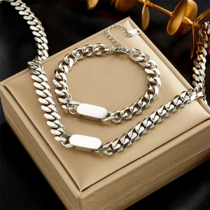 Golden titanium steel Cuban chain necklace and bracelet set with custom engravable metal tag