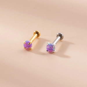 Macro view of 16G stainless steel labret studs with 3mm purple opal stone in gold and silver