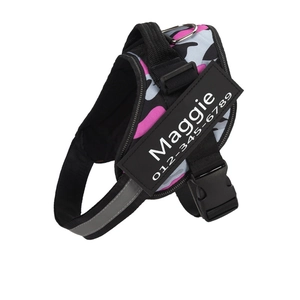 Pink camouflage dog harness with reflective strips and custom patch on white background