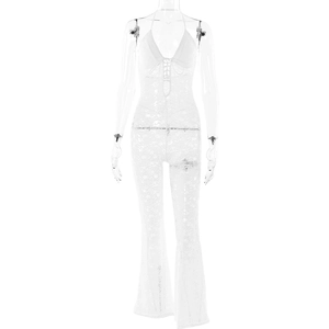 Detailed close-up of white lace halter jumpsuit with sheer floral patterns and flared legs