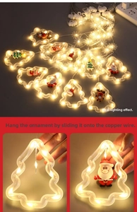 Detail showing the assembly process of Christmas LED string lights with Santa pendants