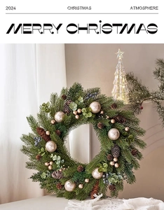 Detail of a Christmas wreath with pine needles, golden ornaments, and natural pine cones