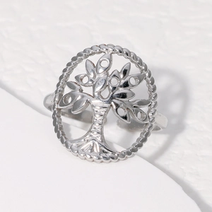 Polished stainless steel Tree of Life ring with openwork design on white background