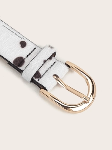 Close-up of leopard print pony hair belt featuring a polished gold oval pin buckle