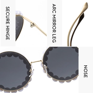 Detail view of round pearl sunglasses featuring secure hinges and ergonomic metal legs