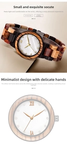 Detail of wooden watch featuring a colorful wood band and mother-of-pearl dial with zircons