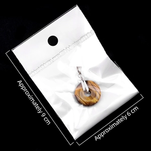 Tiger Eye stone donut pendant necklace with silver clasp in 9x6cm plastic packaging