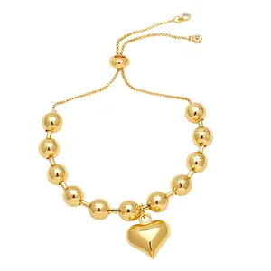 Minimalist 18k gold plated beaded bracelet featuring a polished heart pendant for women