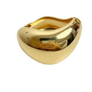 Polished gold geometric spring bracelet with a minimalist irregular metal design