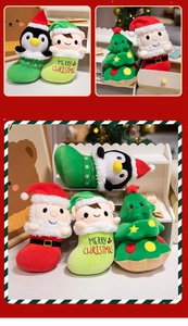 Close-up of four plush Christmas stockings including Santa, Penguin and Tree designs