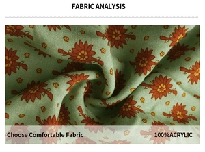Macro view showing the 100% acrylic floral fabric texture in light green and orange