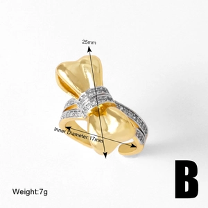 Detail showing dimensions of gold bow ring with inner diameter 17mm and height 25mm