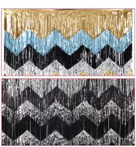 Close-up of multicolored wavy foil fringe curtains for festive party background decor