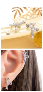 Detailed close-up and model view of silver bow-shaped stud earrings with pavé crystals
