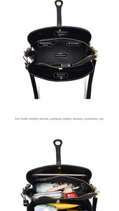 Detailed view of the black leather handbag's multi-compartment interior and storage capacity