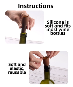 Detail showing the manual installation of a brown silicone wine stopper on a glass bottle