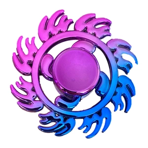 Rainbow gradient metal hand spinner toy with flame-shaped wings and sleek metallic finish