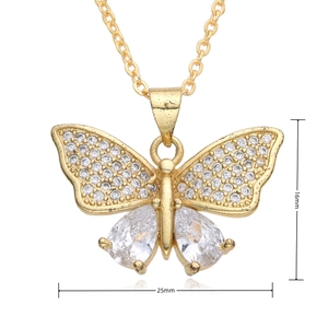 Macro shot of gold butterfly pendant with sparkling zircon and dimensions 16mm by 25mm