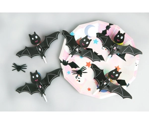 Detail of bat-shaped lollipop paper cards with spiders for Halloween party favors