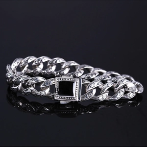 Retro engraved Cuban chain bracelet with black square gemstone inlay on black background