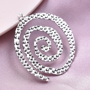 Silver 304 stainless steel spiral pendant with hammered texture on pink silk fabric