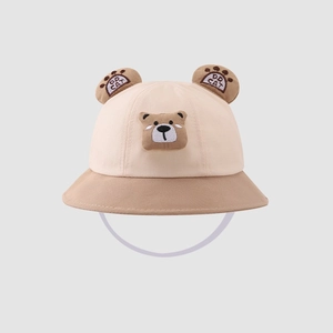 Front view of a cute cartoon bear baby bucket hat featuring 3D ears and plush patch