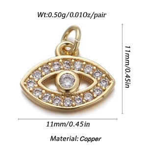 Macro shot of gold-plated evil eye charm with zircon inlay including material and size info