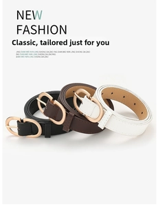 Three minimalist women's leather belts in black, brown and white with gold metal buckles